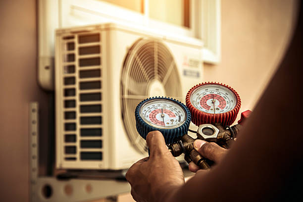 Professional Hvac technician working in Sugar City, ID